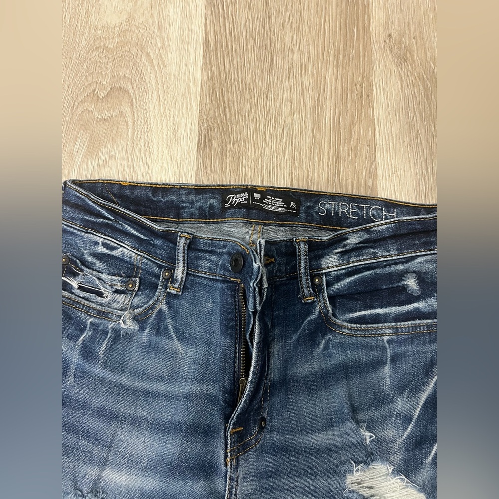 Distressed Blue Skinny Jeans